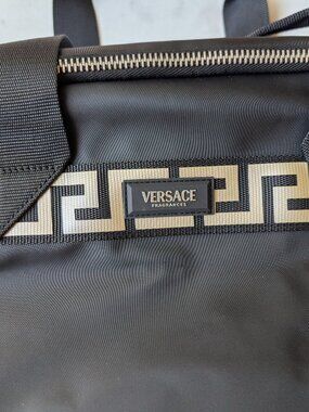 Versace fragrance Duffel bag faux leather like black shoulder strap and handles